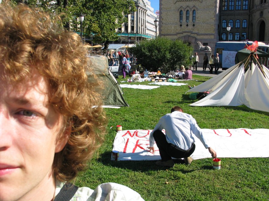 Camping for a cause - in the background the Norwegian parliament