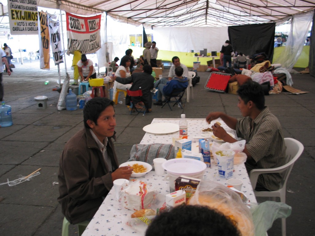 Israel and the others from Oaxaca have their last supper at their camp -- cornflakes.