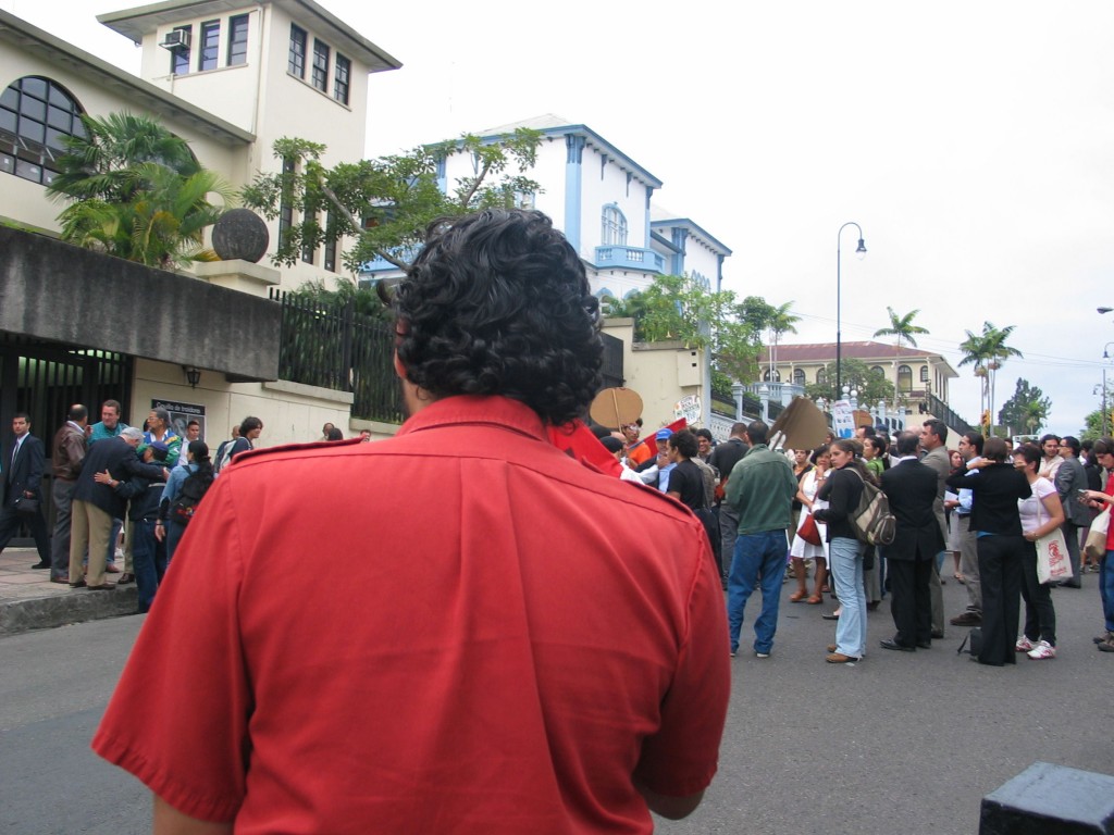 Cesar Lopez holds a speech at a mini demonstration of about 100 activists who were called togetehr the night before to protest that the national assembly is trying to fast track the vote on CAFTA.