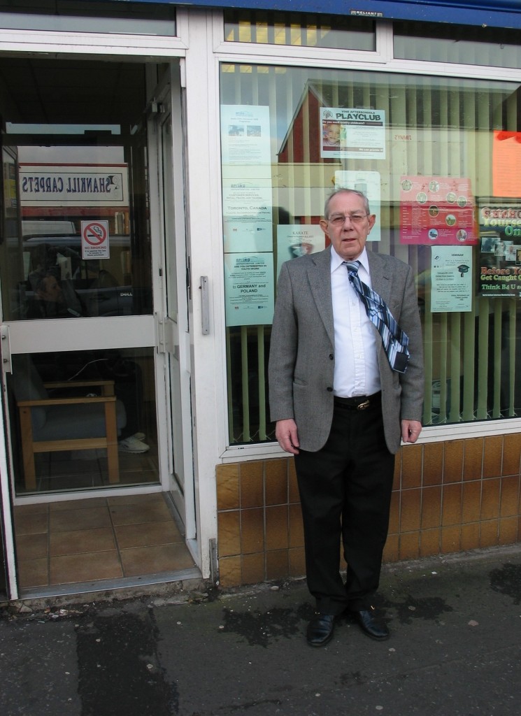 Hugh Smyth is standing outside his office in the Shankills Road.